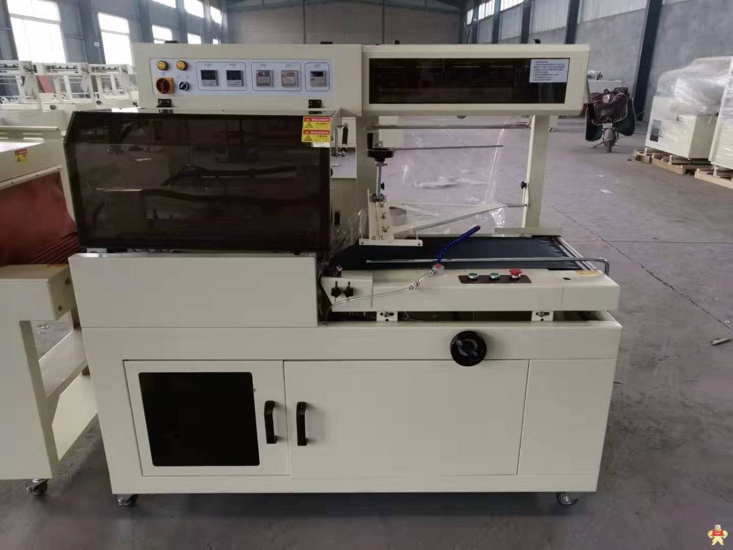 全自动书本热收缩膜包装机 L型封切包装机 450型热收缩包装机 全自动热收缩膜包装机,封切包装机,边封包装机,L型包装机,智能包装机