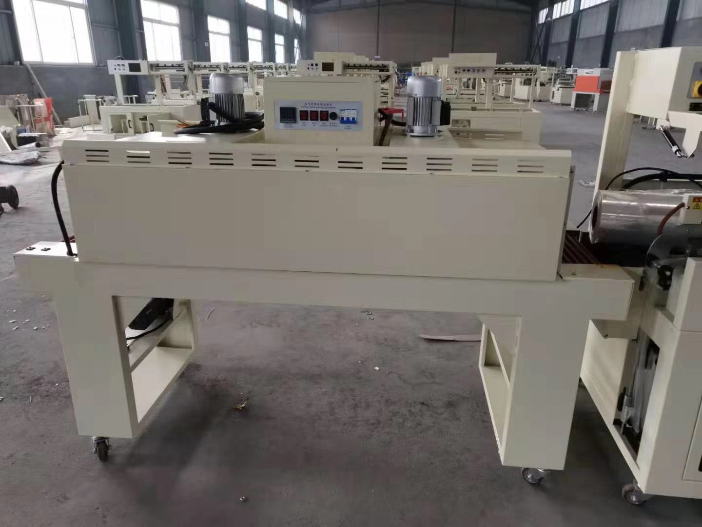 全自动书本热收缩膜包装机 L型封切包装机 450型热收缩包装机 全自动热收缩膜包装机,封切包装机,边封包装机,L型包装机,智能包装机