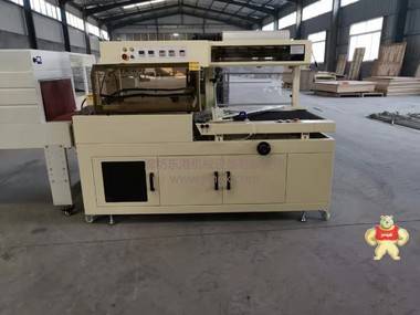 廊坊东港全自动热收缩膜包装机通过ISO9001认证 热收缩膜包装机,边封包装机,L型封切包装机,全自动包装机,袖口包装机